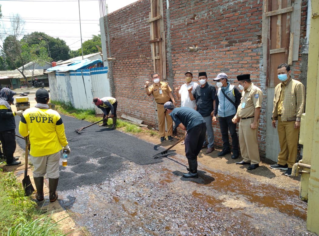 Respons Kelurahan Leuwinanggung, PUPR Aspal Jalan Cakung