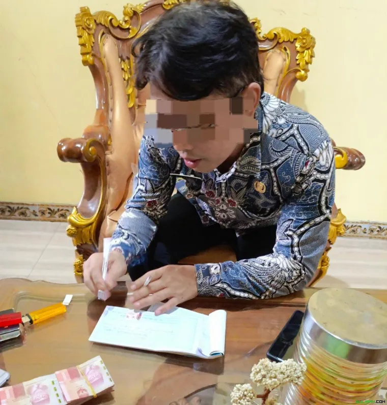 AS, diduga pelaku penggelapan. 