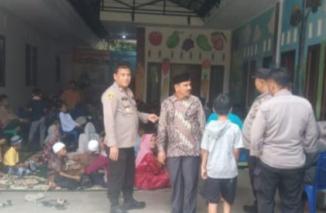 Kapolsek Sitiung Hadiri Acara Santunan Anak  Dan Sunatan Massal